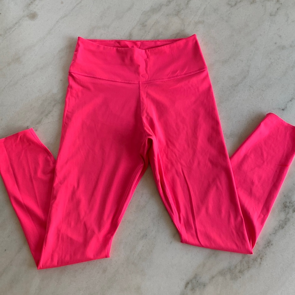 Bright pink Nike.